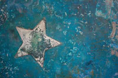 Mixed media on recycled panel.