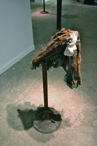 A Dream: a drowned girl, Ophelia, rising from the earth of a prairie field. Residues of possible histories.